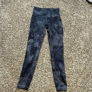 Lululemon black marble leggings, size 4, older version of their leggings.